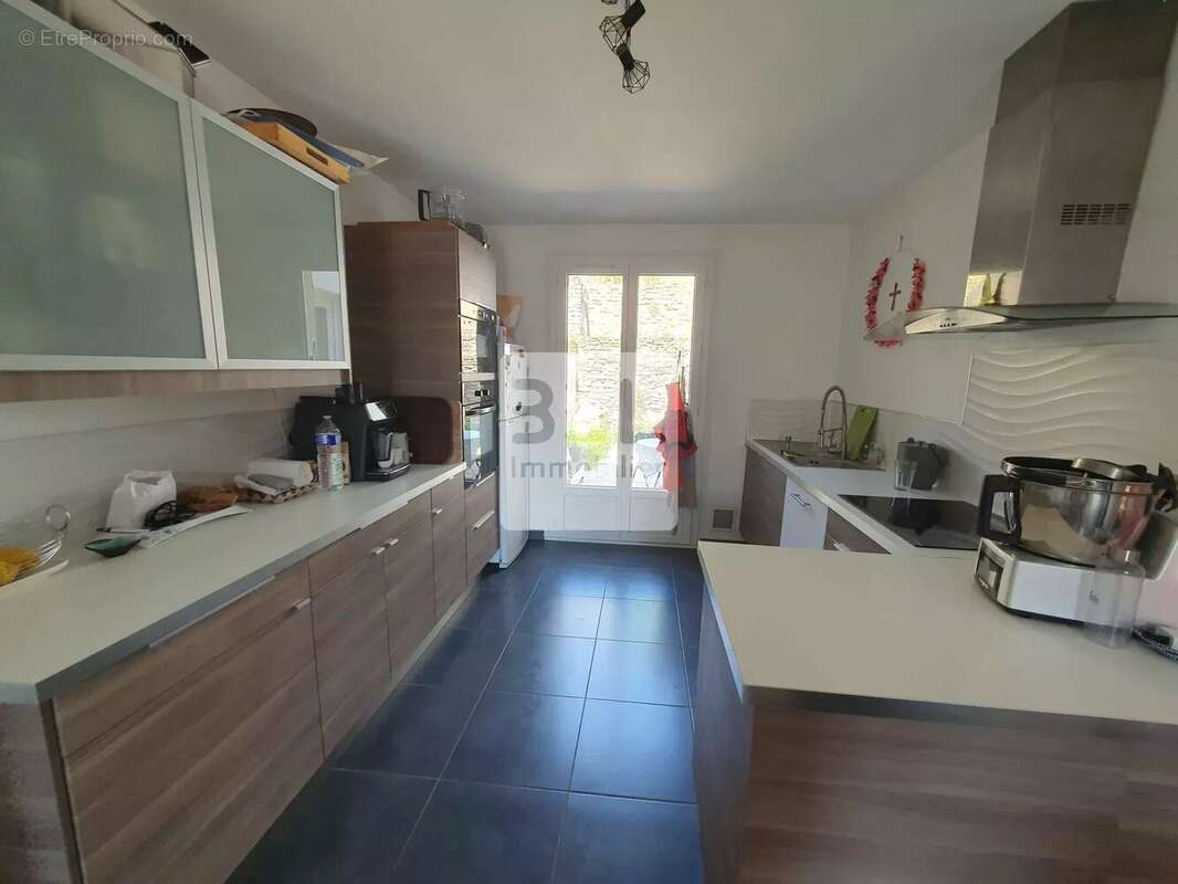 Maison à LAUDUN-L'ARDOISE