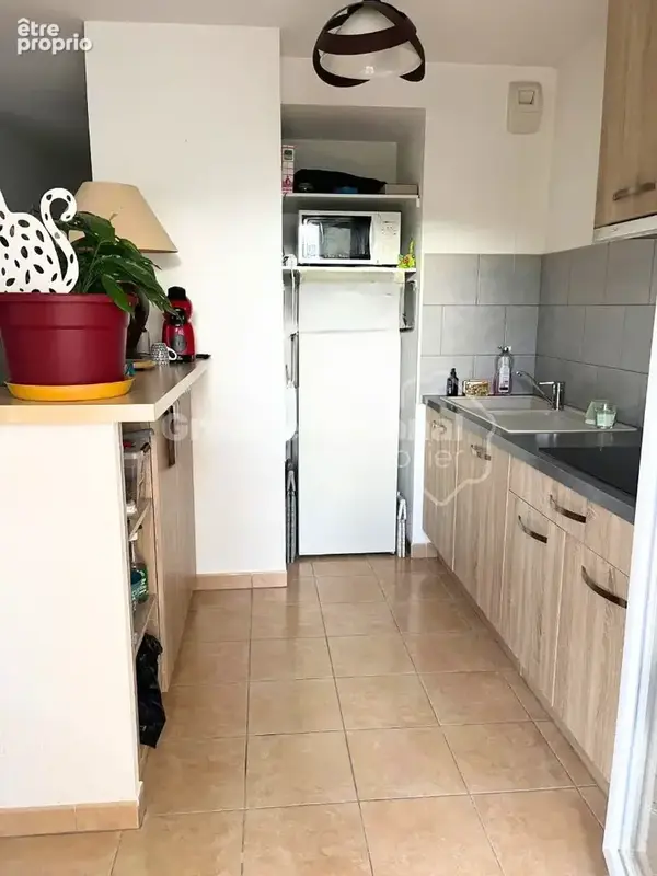 T2 de 44m² climatisé et traversant + 2 places de parkings privatives dans une copropriété prisée - photo 7
