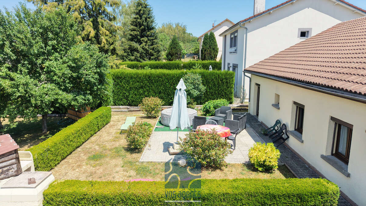 Maison plain-pied avec terrasse, garage et annexes - photo 12