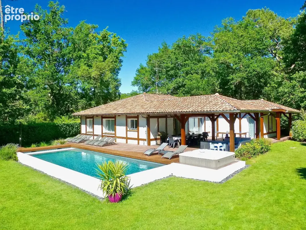Entre Forêt Landaise et Art de Vivre  Ensemble de deux maisons sur 1638 m² de terrain boisé. - photo 2