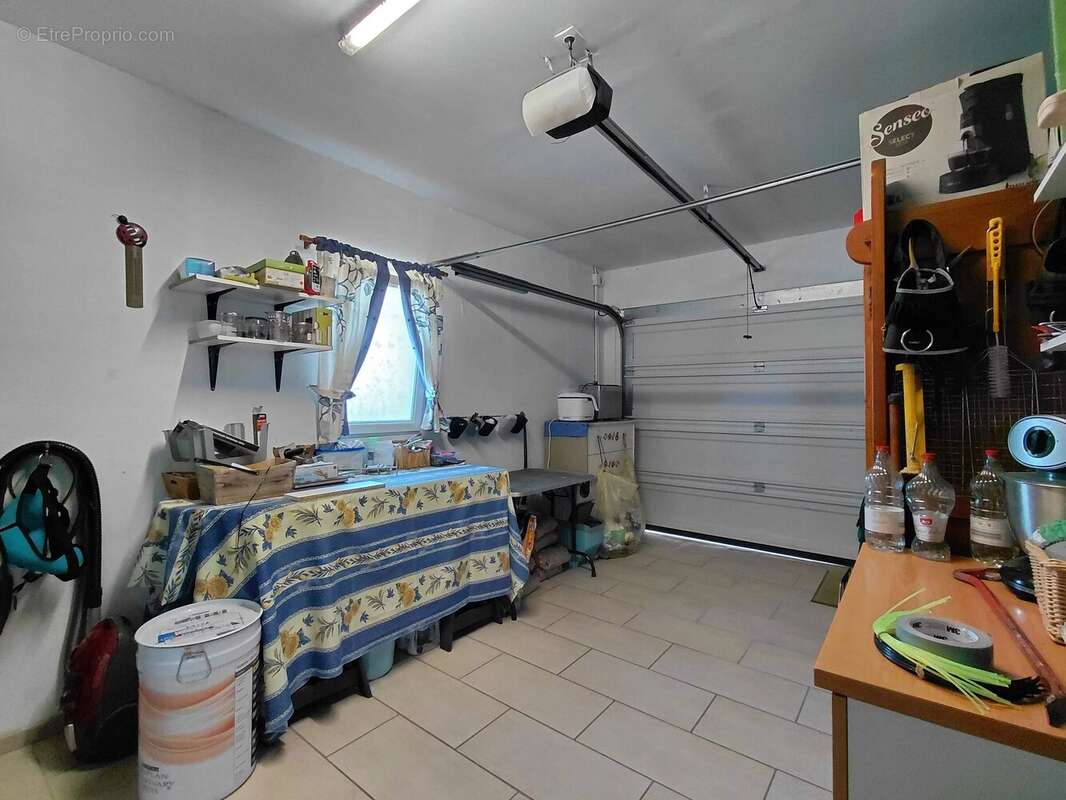 Maison de plain-pied avec double garage, atelier et terrain de 1 200 m² - photo 12