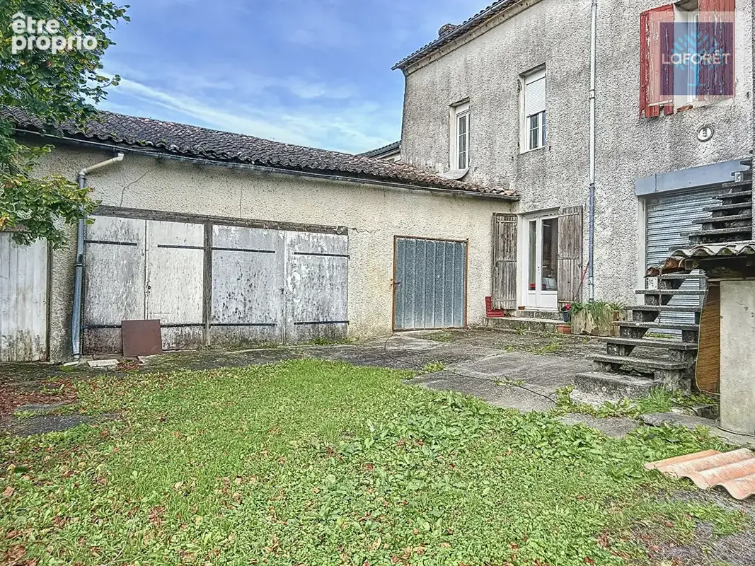Immeuble de rapport : 2 maisons + local commercial - photo 4