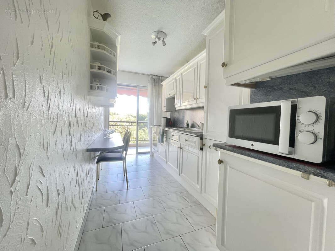 2P, 57m2+grand balcon, au calme, vue dégagée et verdoyante, proche commerces - photo 5