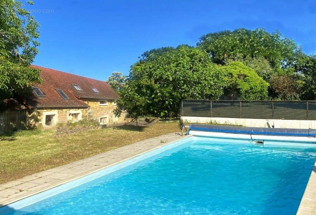 Maison en pierre avec piscine à Excideuil 5 pièce(s) 180 m2 - photo 2