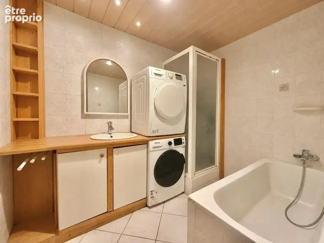 Appartement T4, 3 chambres, en rez-de-chaussée, avec cave en sous-sol - photo 5