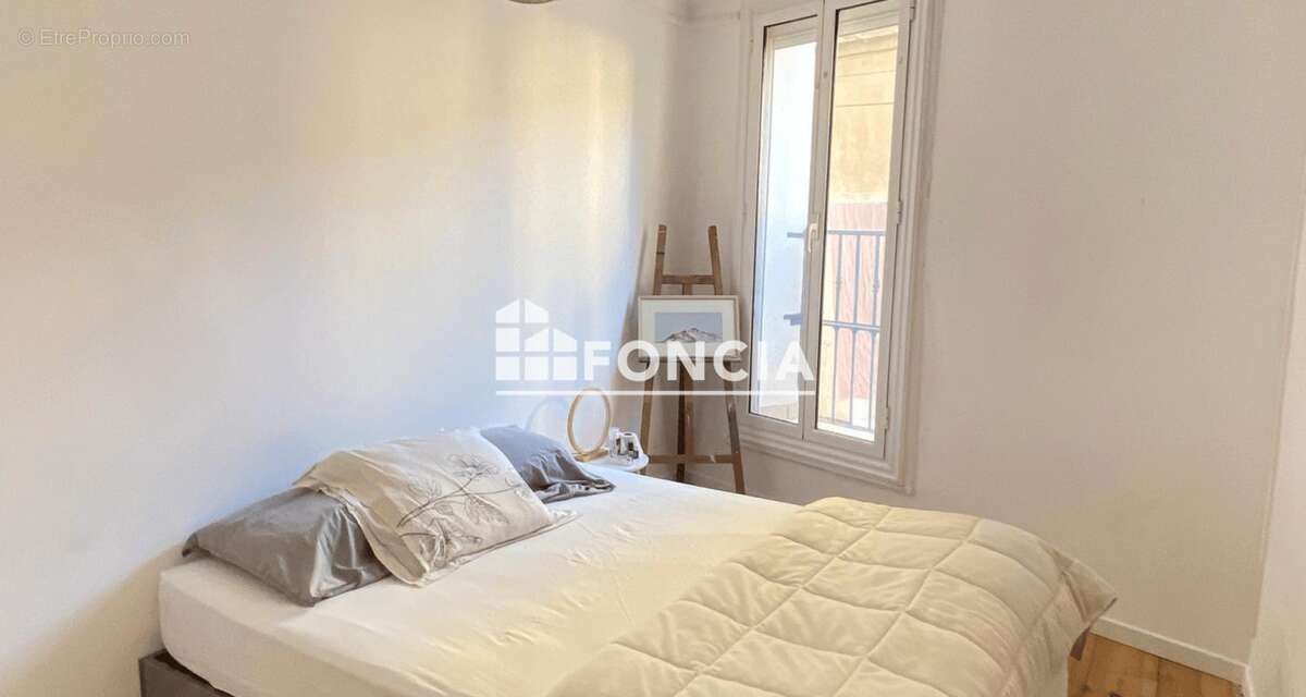 Sète centre-ville — Bel appartement traversant de 66 m² au 1er étage, DPE B, dans une petite copropriété calme à deux pas des co - photo 4