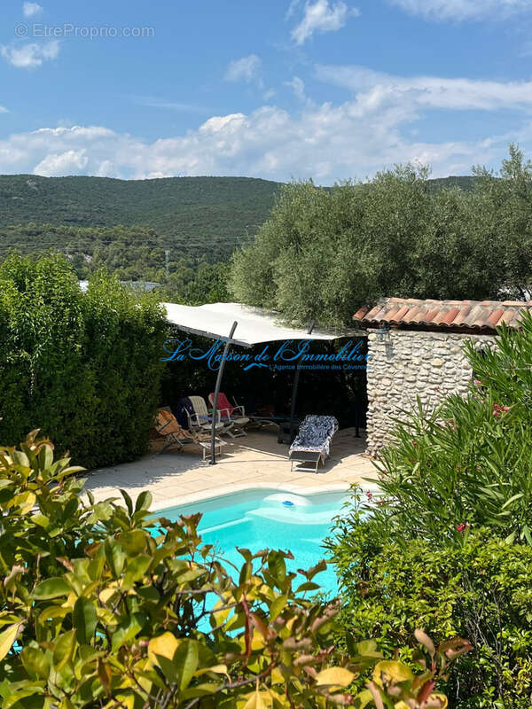 Aux portes d'ANDUZE, maison d’architecte F6 de 210 m2 avec piscine, vue panoramique et terrain de 5843 m2 avec - photo 2