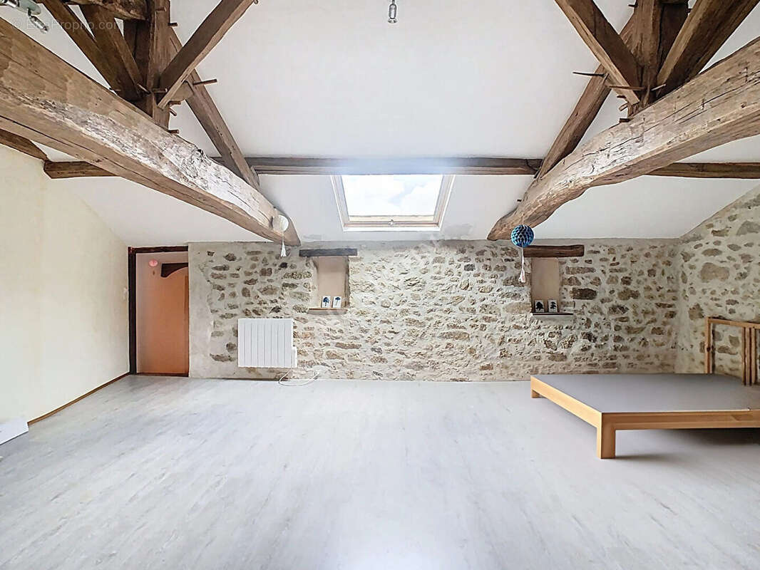 Venez découvrir cette magnifique maison en pierres apparentes, nichée dans un écrin de verdure, à seulement 5 km de l'axe Nantes - photo 14