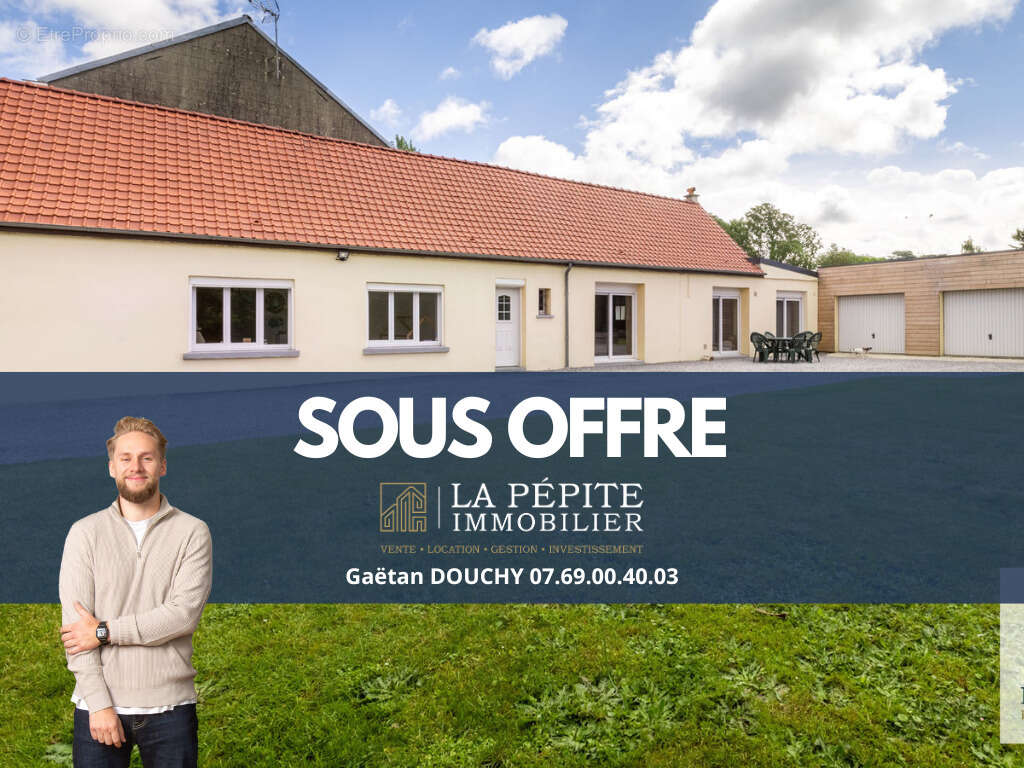 Maison à DOUCHY-LES-MINES