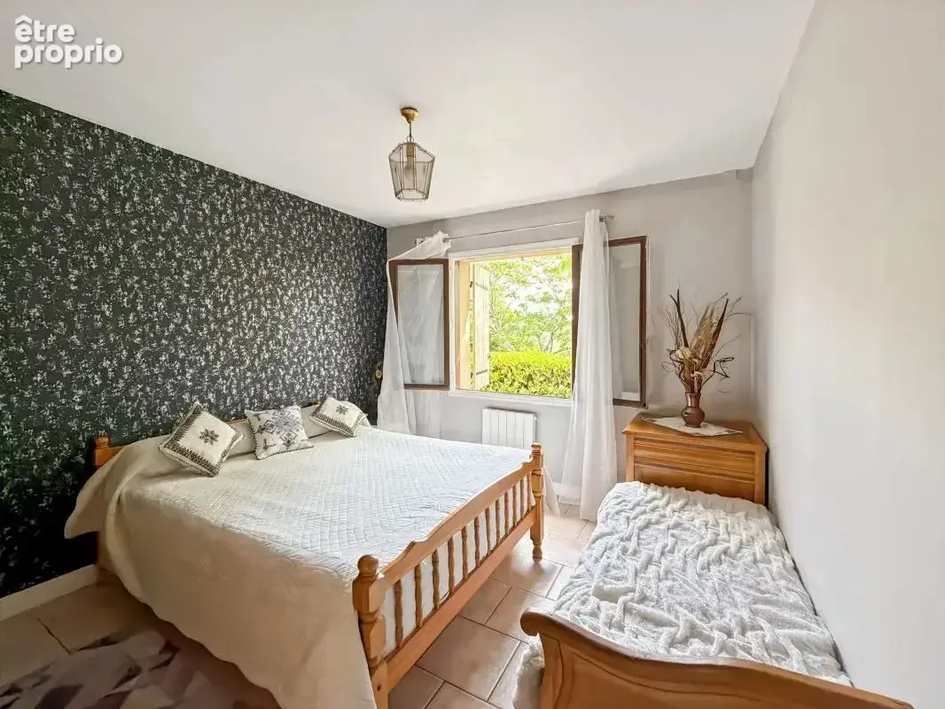  Maison familiale de plain-pied avec vue dominante – Un cadre de vie privilégié à La Chapelle-Gonaguet - photo 10