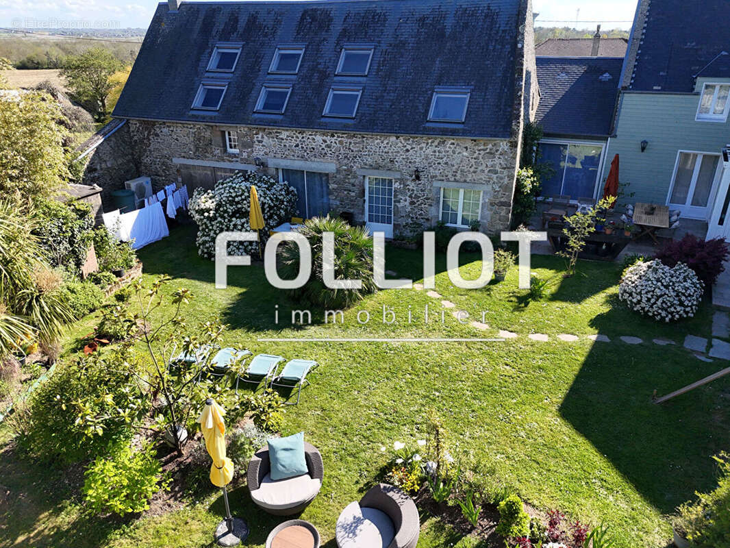 Maison à AGON-COUTAINVILLE