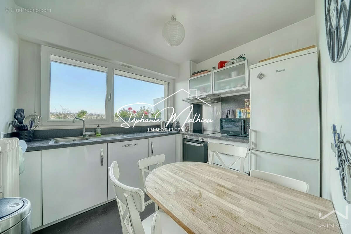 EXCLUSIVITE - Rueil Triangle d’Or   4 pièces, 5e étage, balcons, jolie vue, parking en sous-sol + cave - photo 5