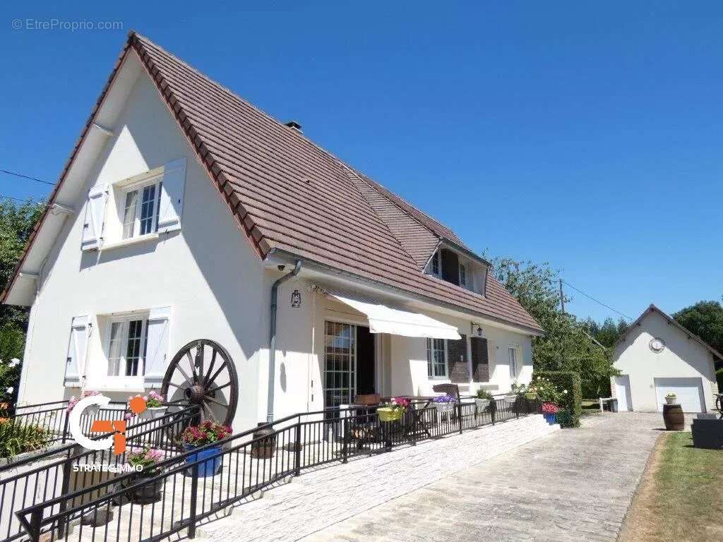 Maison à SAINT-OUEN-DE-THOUBERVILLE