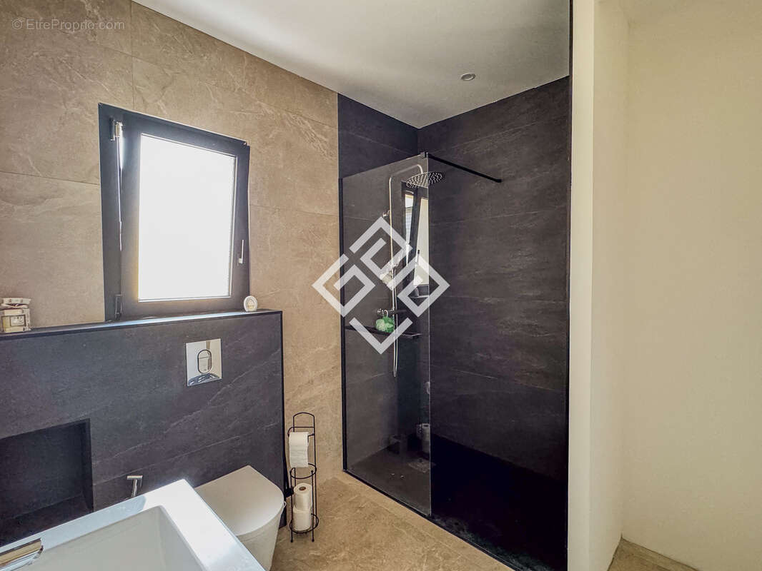 Une élégante villa contemporaine de plain-pied - photo 14
