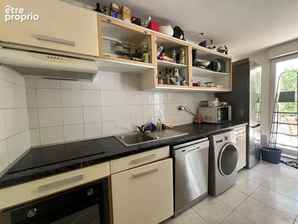 Appartement T3 65.88m² en rez de jardin avec stationnement - photo 6