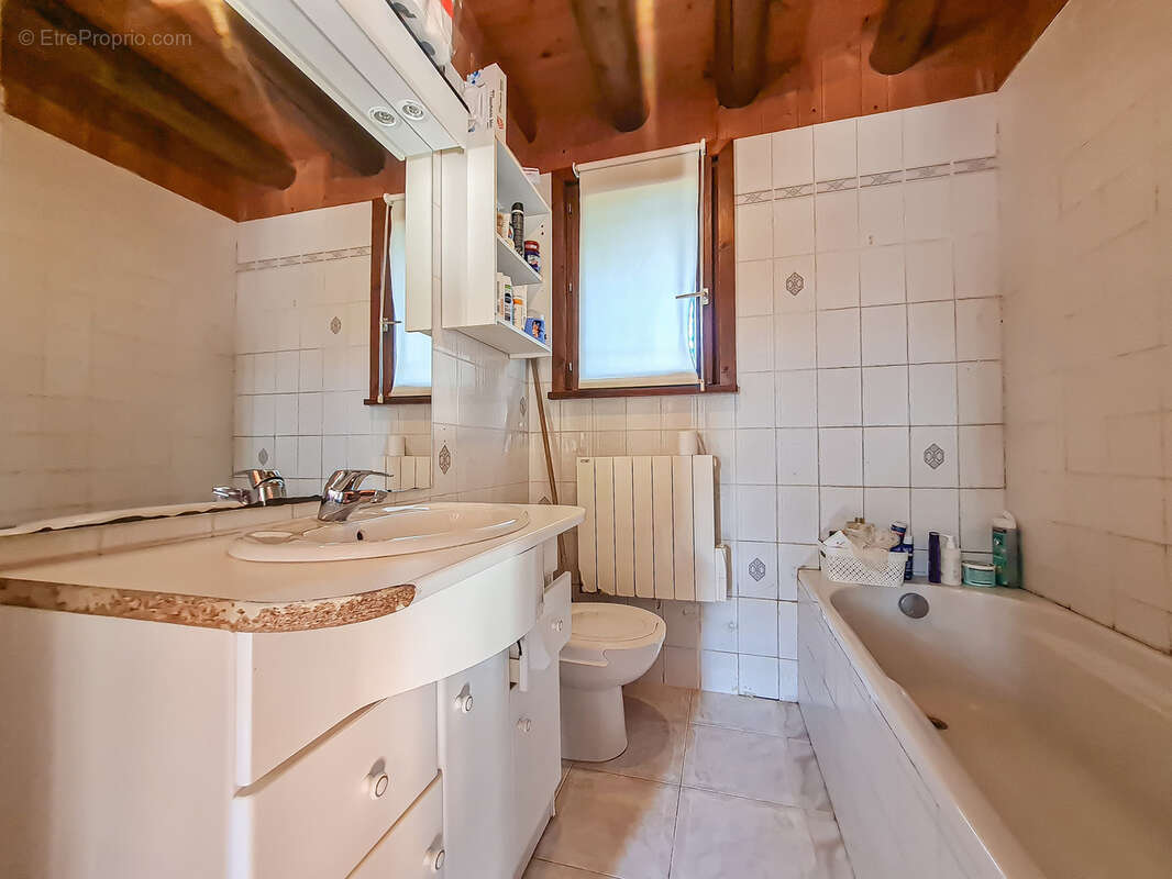 Chalet de 100m2 - parcelle de 800m2 - bogeve 74250 - photo 13