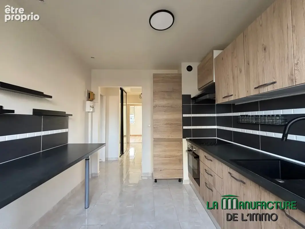 Saint etienne rue palluat de besset - appartement t4 renové avec 3 chambres cave et garage - photo 7