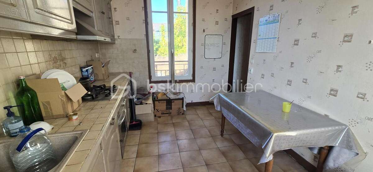 Maison ancienne avec grand local - photo 7