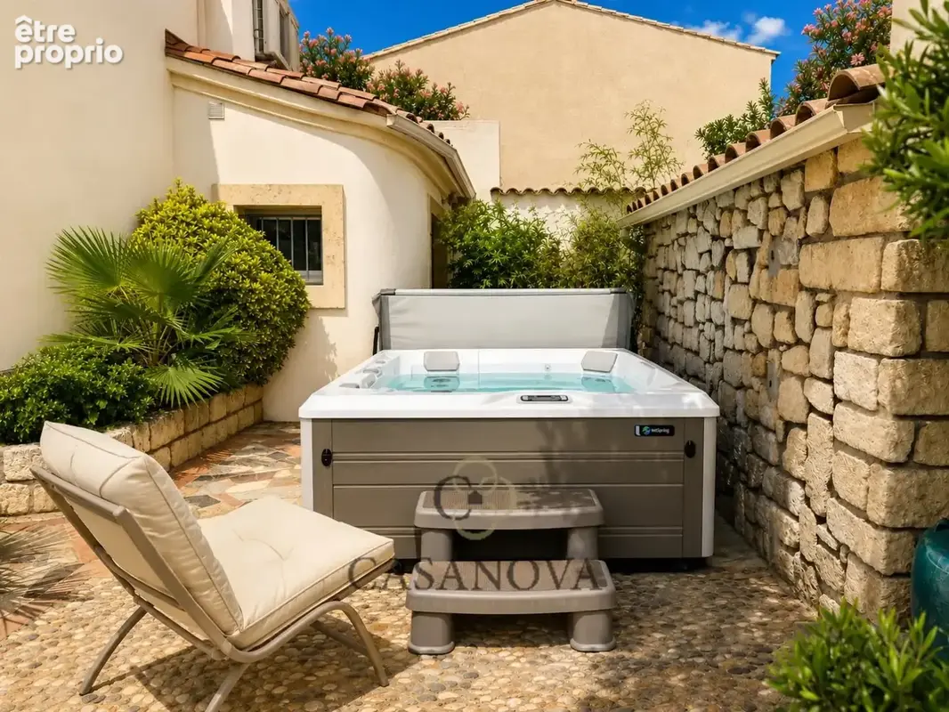 Maison 191 m² avec jardin paysager, jacuzzi et garage au centre de Pérols - photo 9