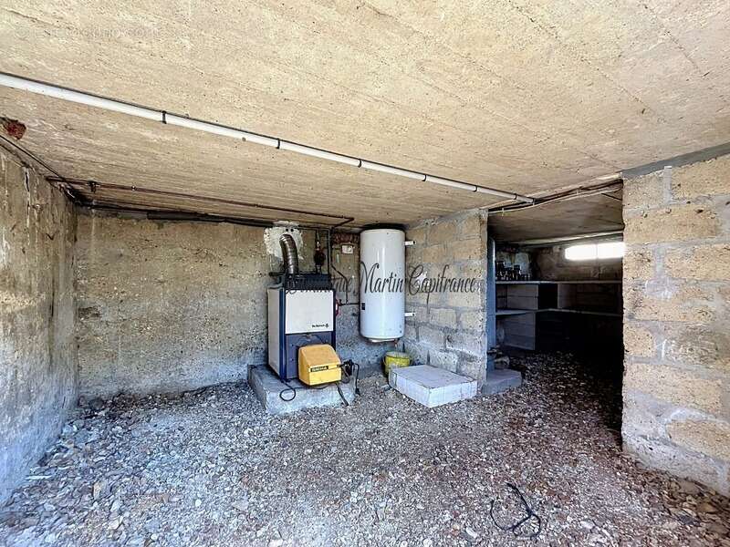 Maison à vendre 4 pièces LHOMME (72)-Maison de plain-pied à réinventer – Petit prix, emplacement idéal au cœur de Lhomme ! - photo 11