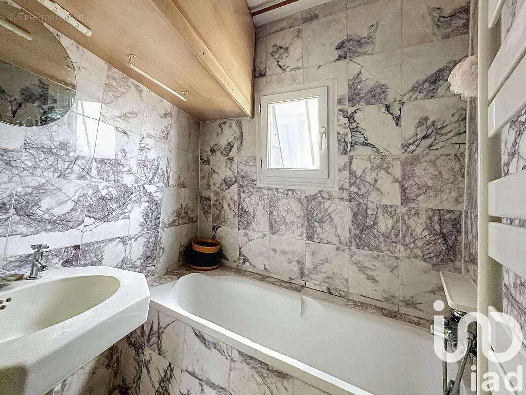 Photo 8 - Appartement à PARIS-18E