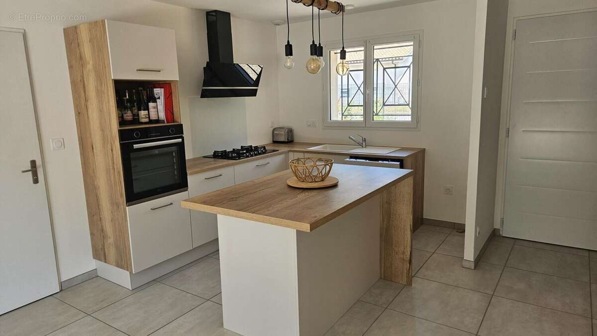 Photo 2 - Maison à LE TUZAN