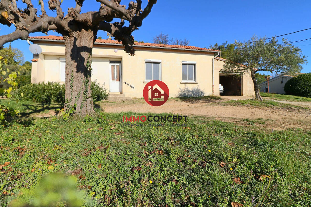 Maison à LAUDUN-L&#039;ARDOISE