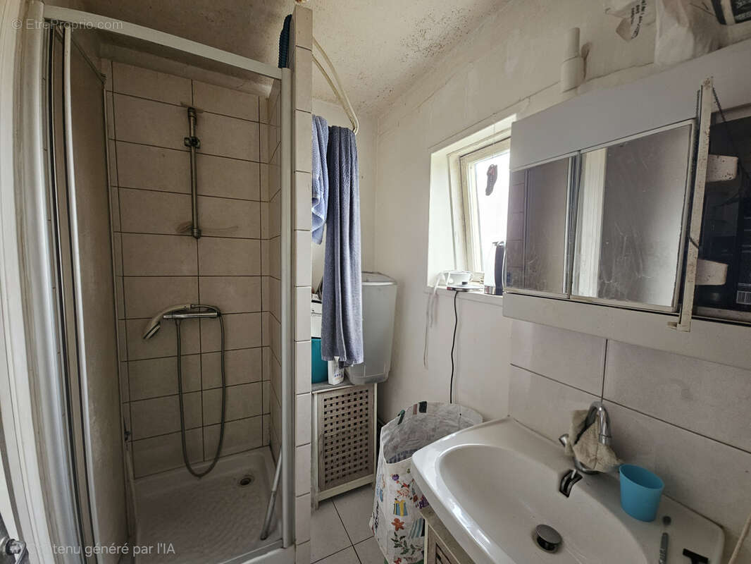 Appartement à DONVILLE-LES-BAINS