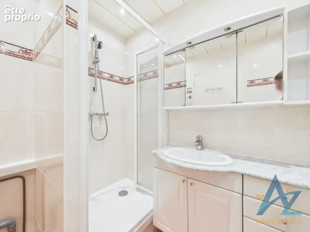 Appartement à deux pas des commerces - photo 7