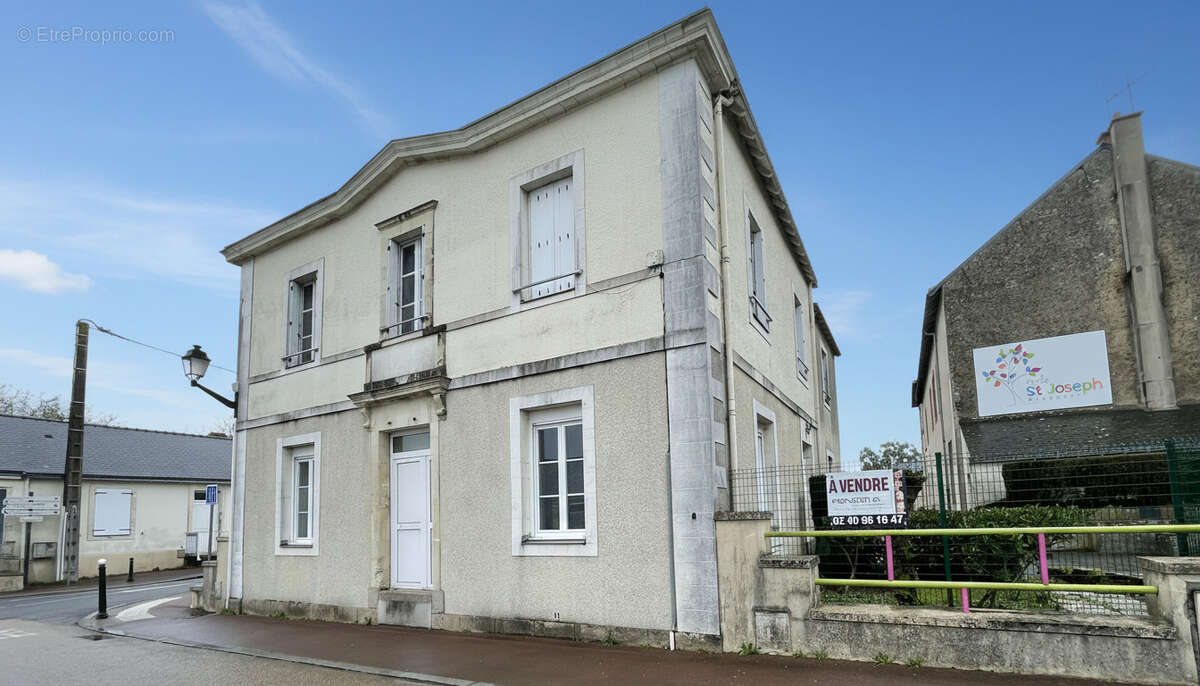 Idéalement situé en centre-ville, bien à fort potentiel - photo 3