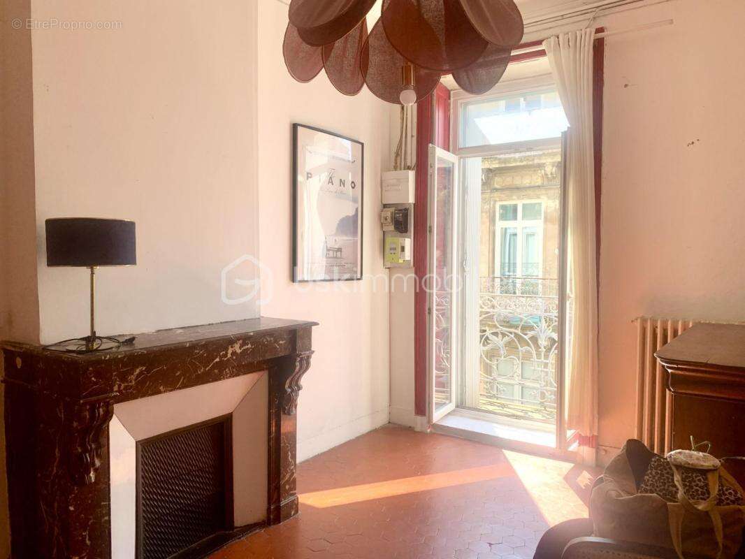 COMÉDIE – Véritable appartement haussmannien de 82 m², lumineux, 3 chambres - photo 2