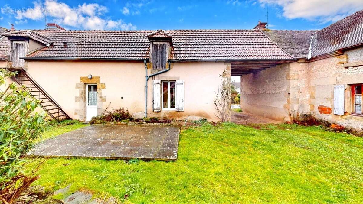 Maison à AGONGES