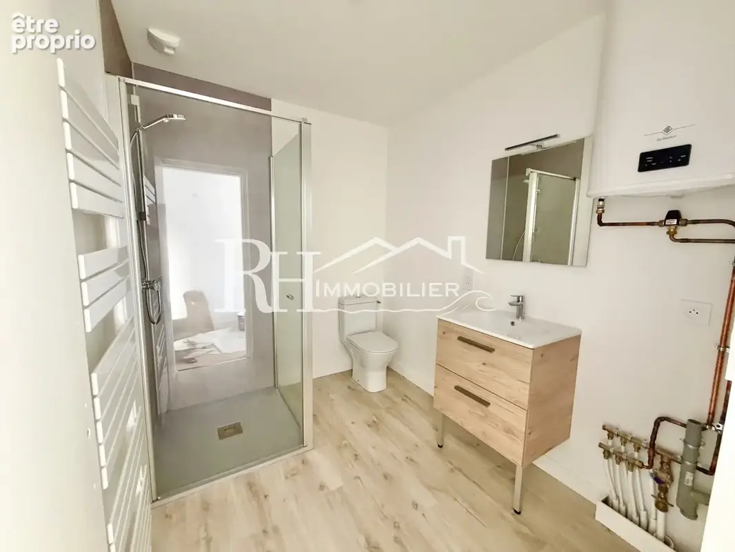 Appartement rénové plein centre bourg - photo 5