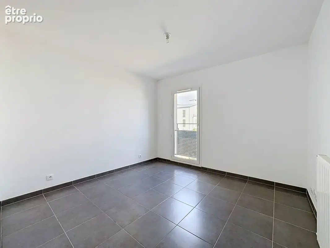 T2 centre bourg chessy de 40.33m2 avec place de parking en sous sol - photo 9