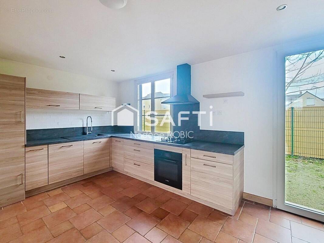 Photo 1 - Maison à SEICHES-SUR-LE-LOIR