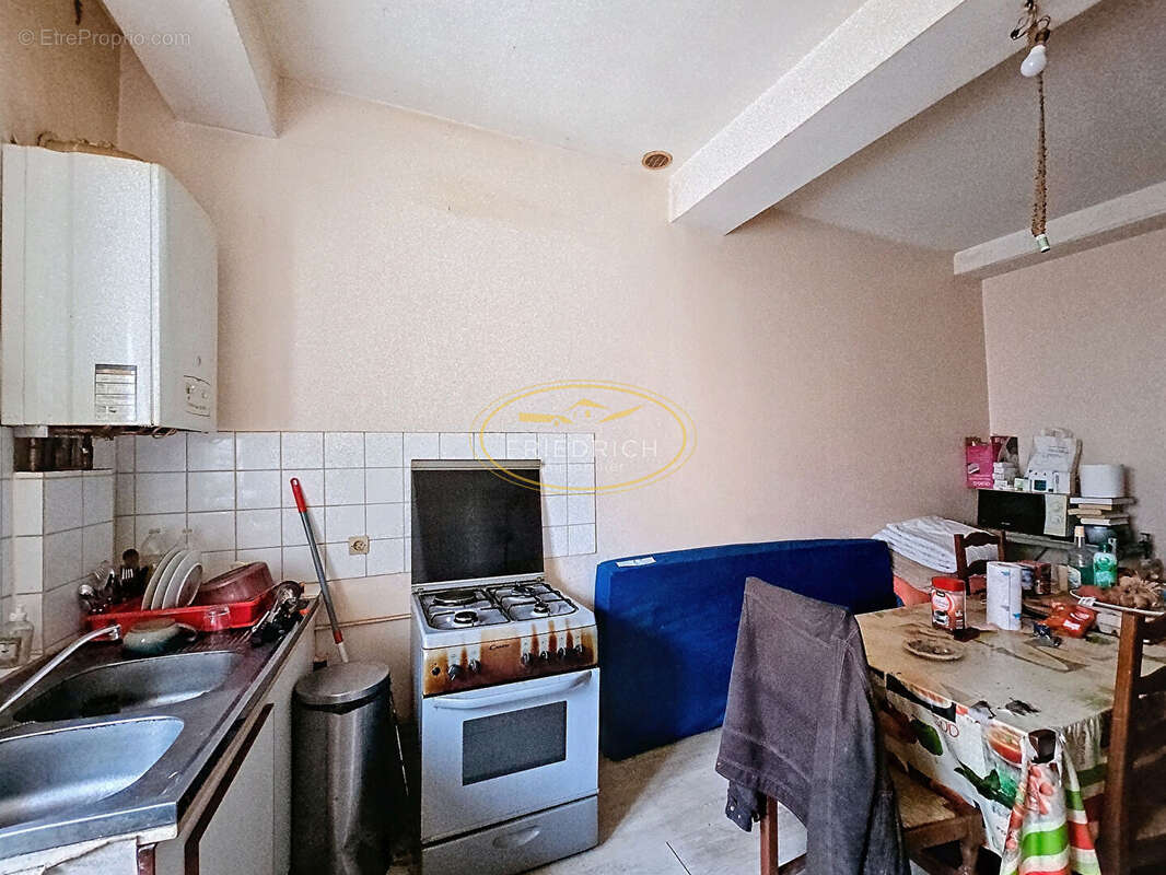 Ensemble immobilier - logements loués - photo 4