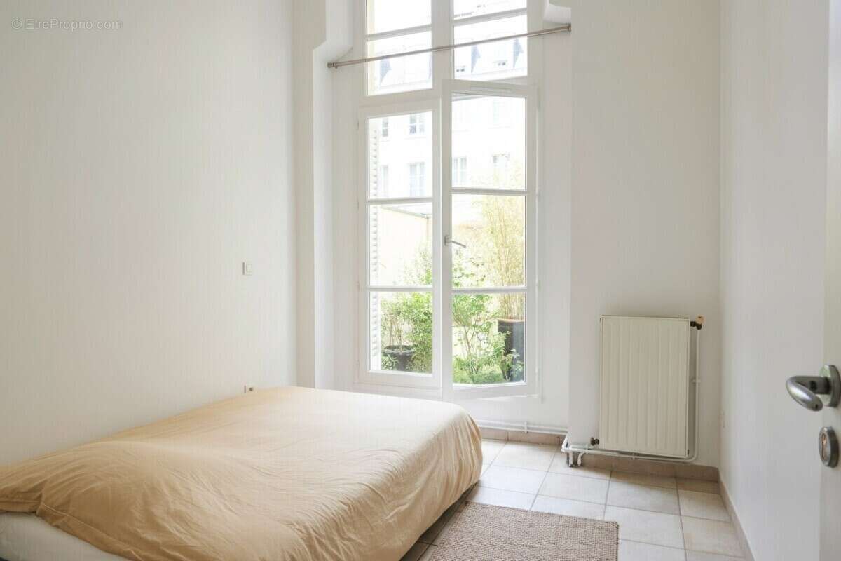 Appartement - Paris 11ème - 2 pièces - 54m² - photo 4