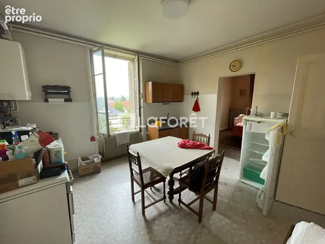 Lons-le-Saunier · Maison de caractère en pierre · 2 logements indépendants · Jardin 770 m² · Idéal investissement ou famille - photo 9