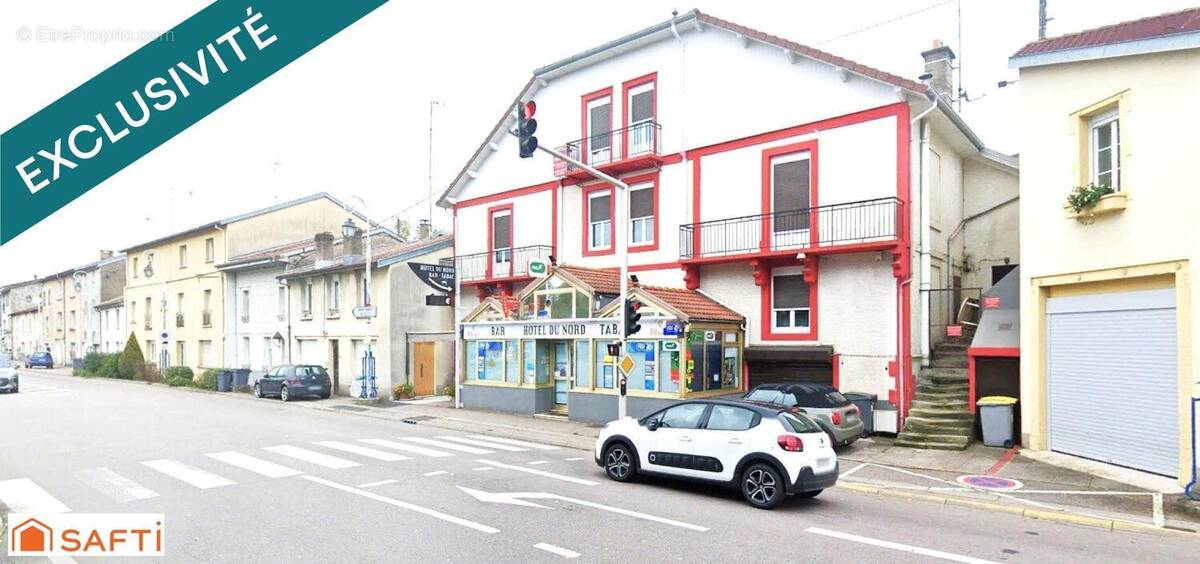 Photo 1 - Commerce à CONTREXEVILLE