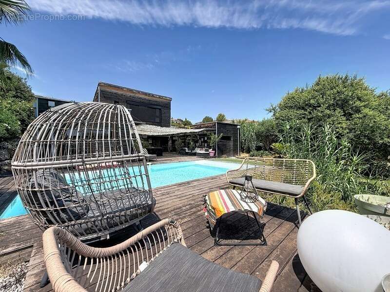 Juvignac : fontcaude – villa contemporaine en bois avec piscine et vue panoramique sur le golf - photo 19