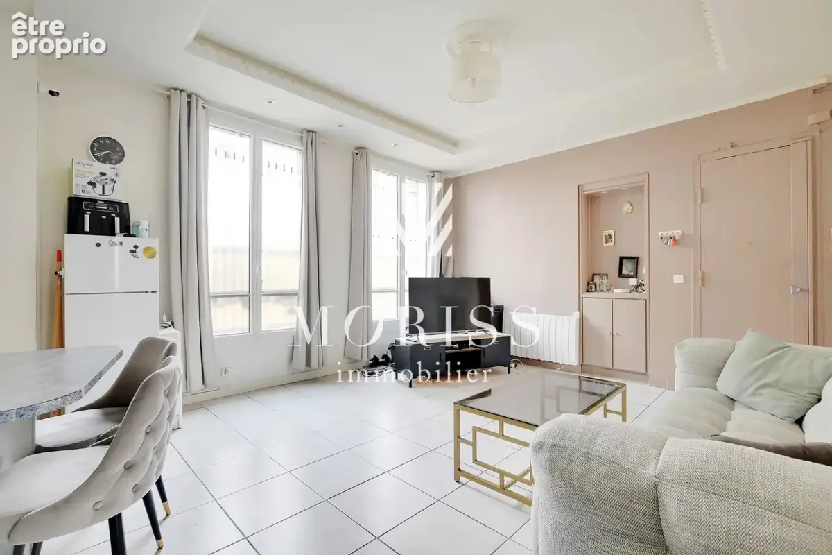 Appartement trois pièces - rue simart - 75018 paris - photo 2