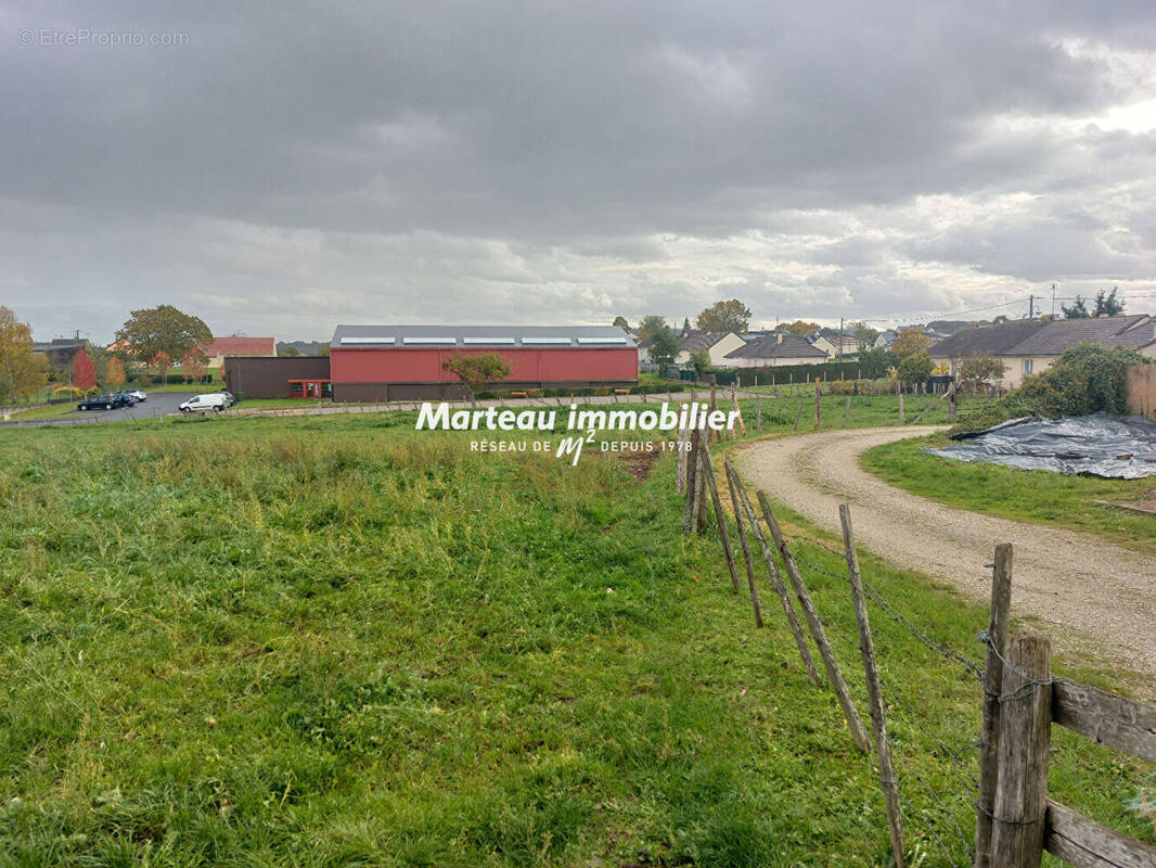 Terrain à SAINT-AUBIN-DE-LOCQUENAY