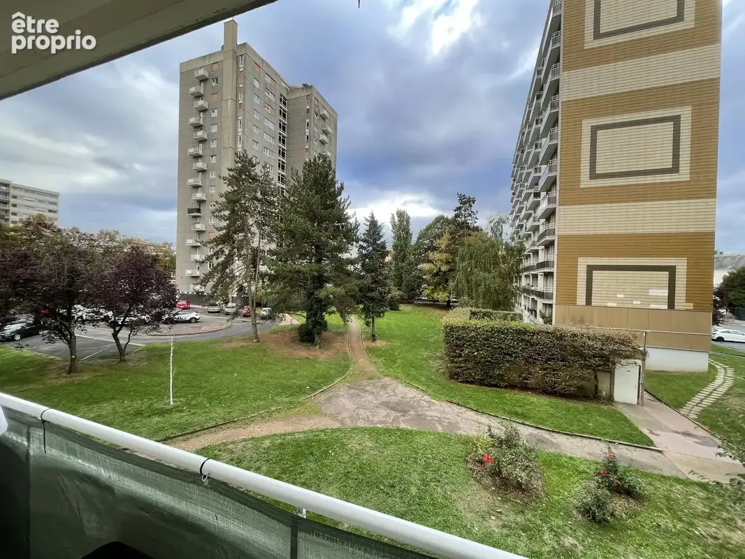 Appartement T4 avec balcon et cave - photo 1