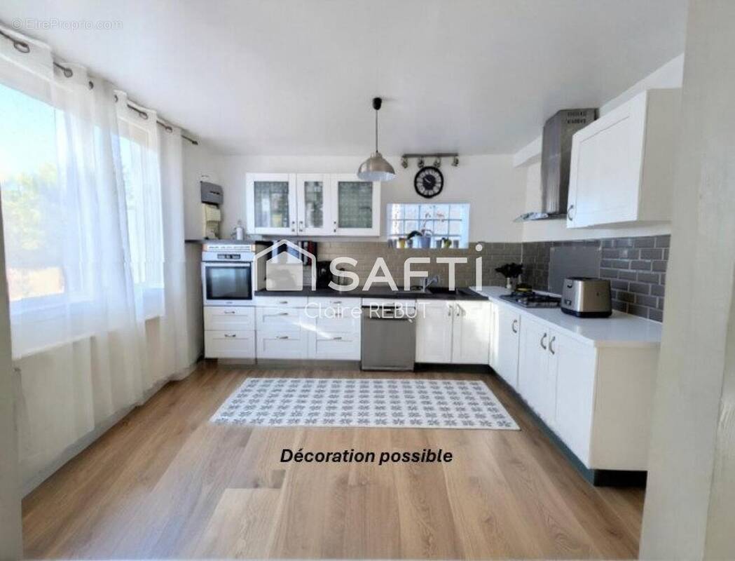 Photo 1 - Maison à LIVRY-GARGAN