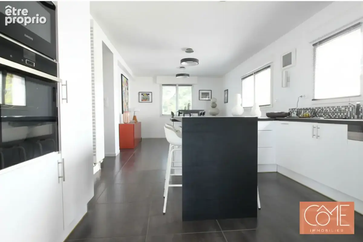 Cesson-sevigne - la menouriais - maison de 234 m² - espace de vie de  plus de  95 m² - terrain sud de 668 m² - piscine - photo 5