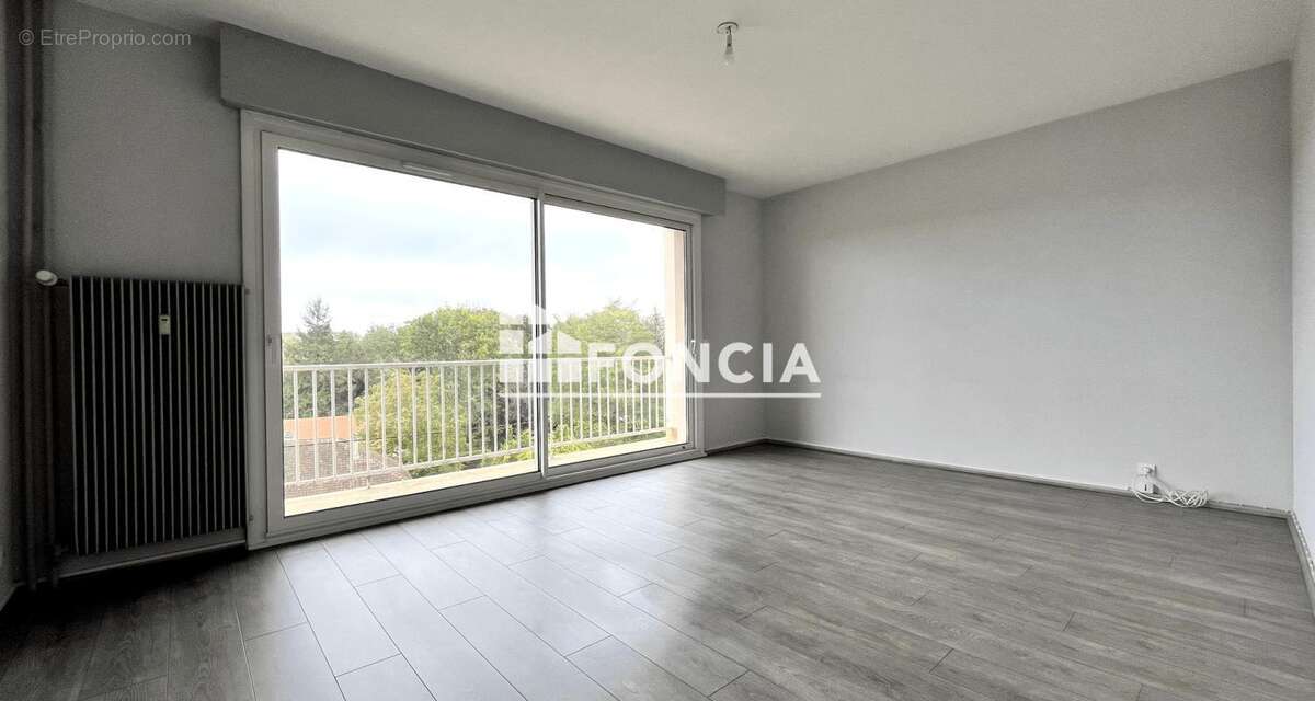Appartement F3 + garage+cave - photo 3