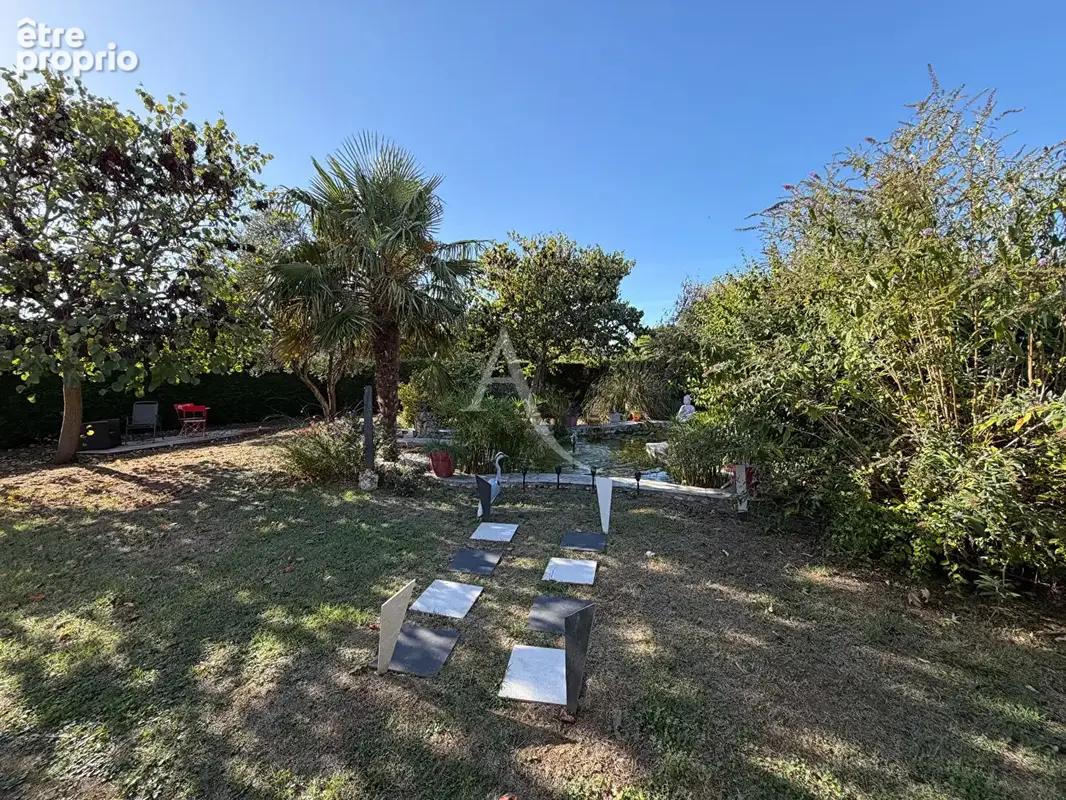 Maison 3 chambres avec véranda, garage, atelier et beau jardin - photo 16
