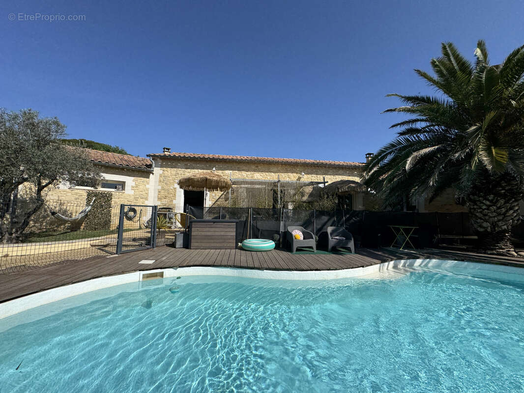 Maison à LAUDUN-L'ARDOISE