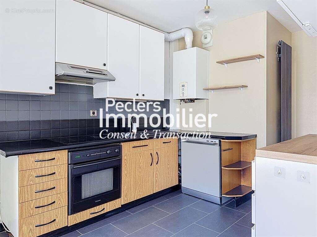 Appartement 3P en centre-ville avec cave et parking - photo 4
