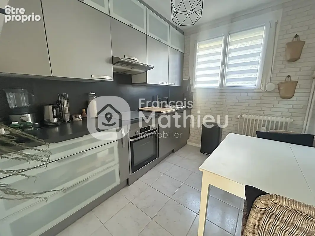 Mâcon - Appartement T4 avec balcon, garage et cave. - photo 5